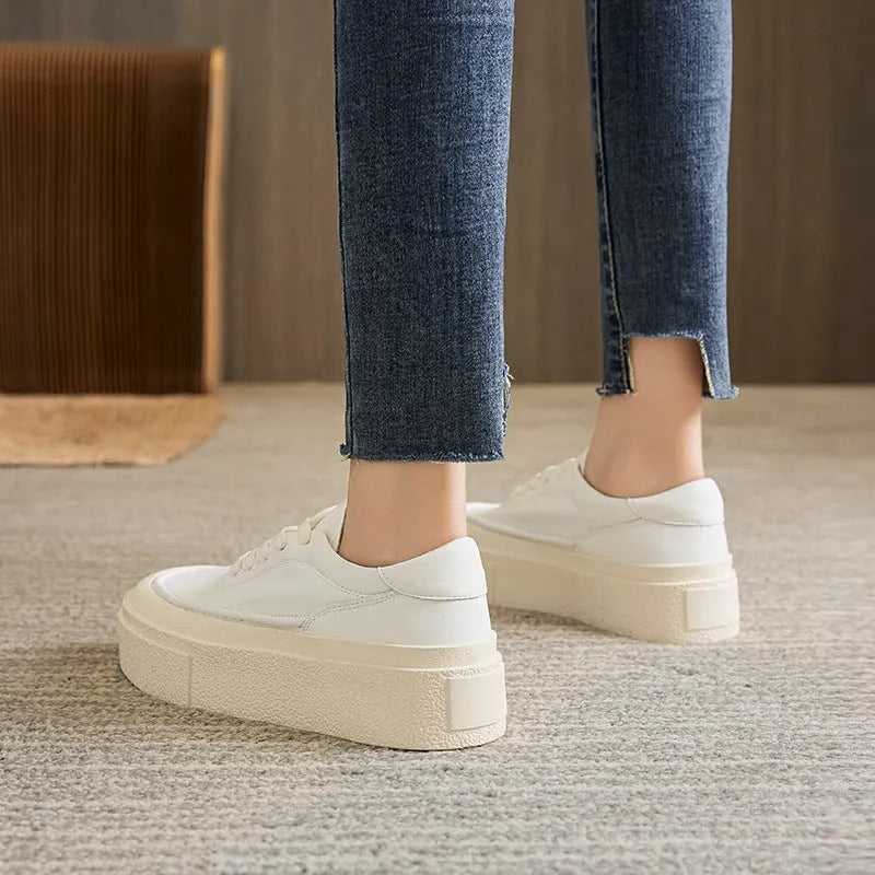 Women's black platform casual shoes with embossed cowhide leather upper and rubber sole
