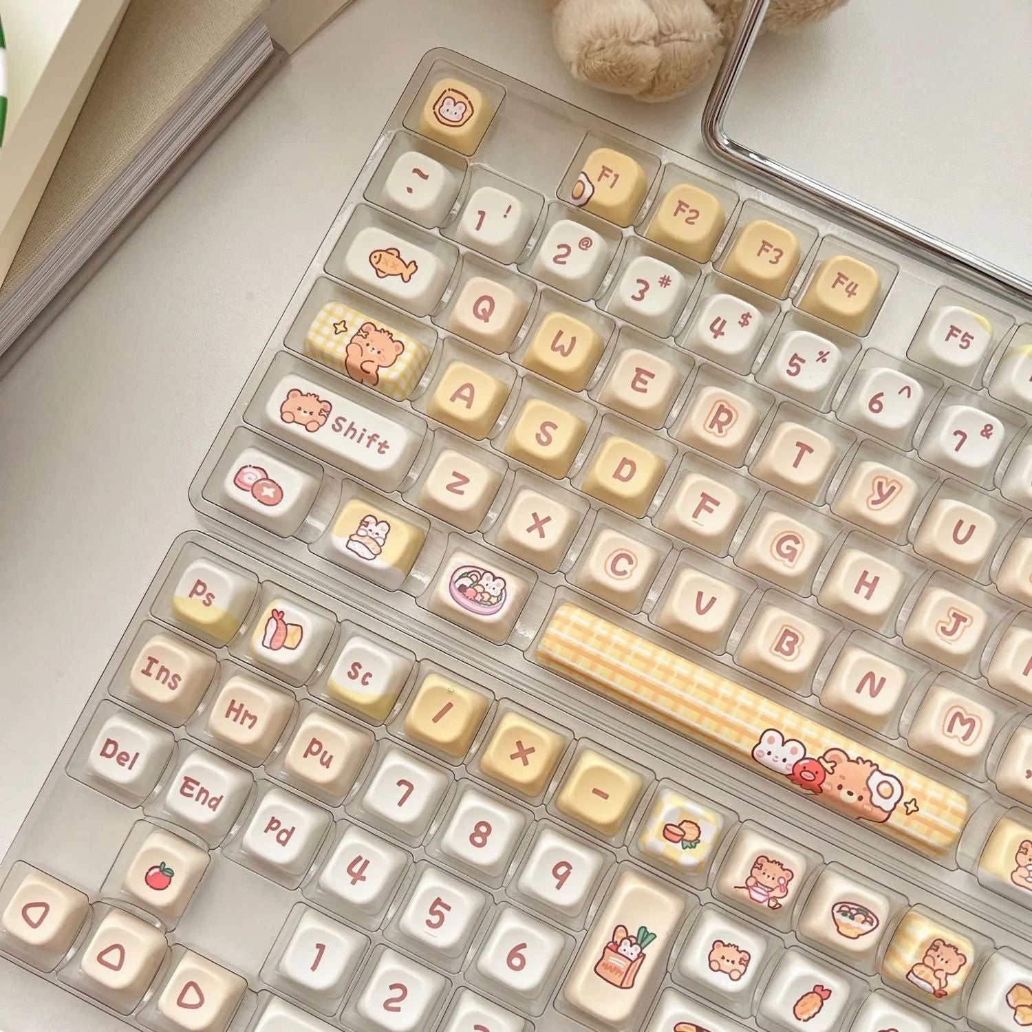 Rabbit Bear Restaurant themed mechanical keyboard keycap set showing 140 PBT plastic keycaps with colourful designs.