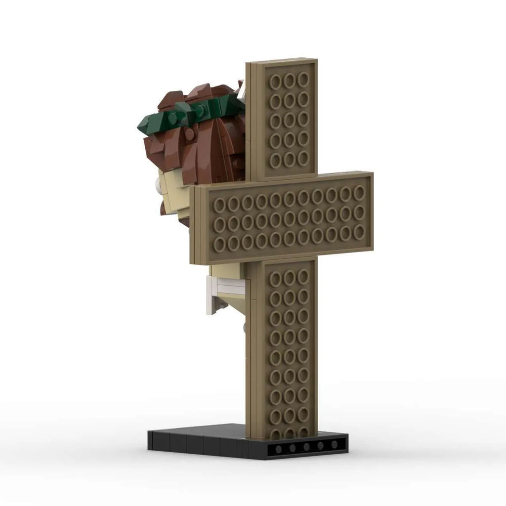 Jesus cross building block toy made from interlocking plastic pieces in a net pocket