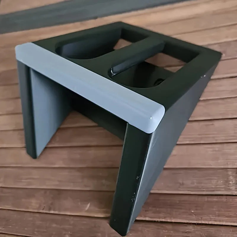Black plastic pistol stand gun holder measuring 10.85cm x 7.6cm for displaying replica firearms