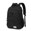 Grey nylon backpack with USB charging port and trolley strap on luggage