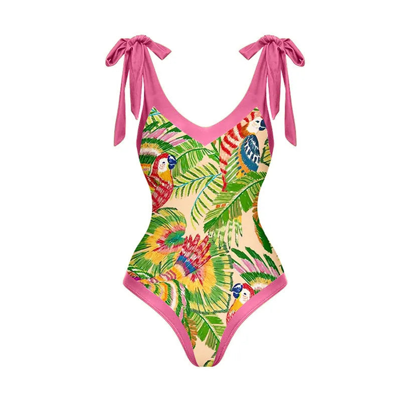 Pink floral print one-piece swimsuit with V-neck, covered belly design, and attached thin skirt