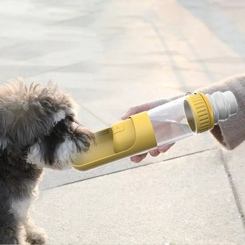 Portable dog water bottle with integrated drinking bowl in dark blue, white or yellow colours