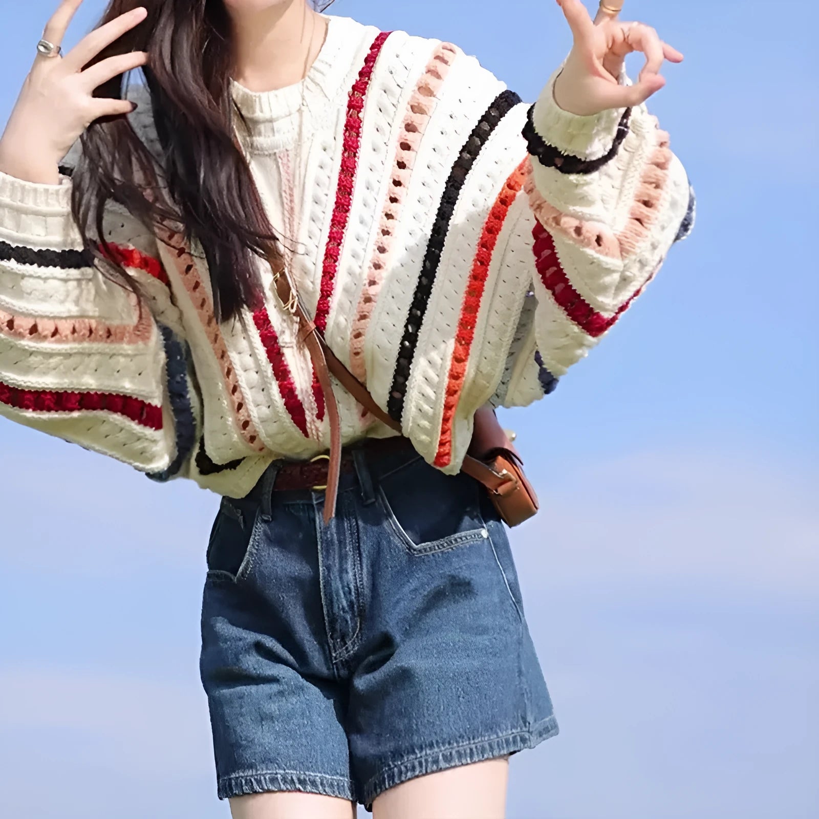 Rainbow striped loose fit sweater with batwing sleeves and round neck
