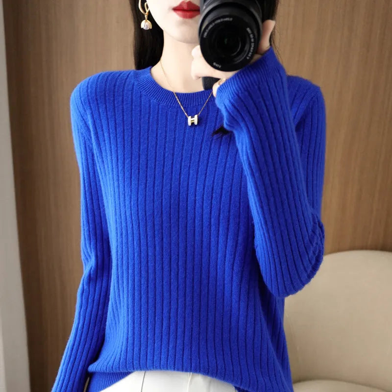 Autumn women's knitwear round neck sweater in beige, low collar long sleeve pullover on model