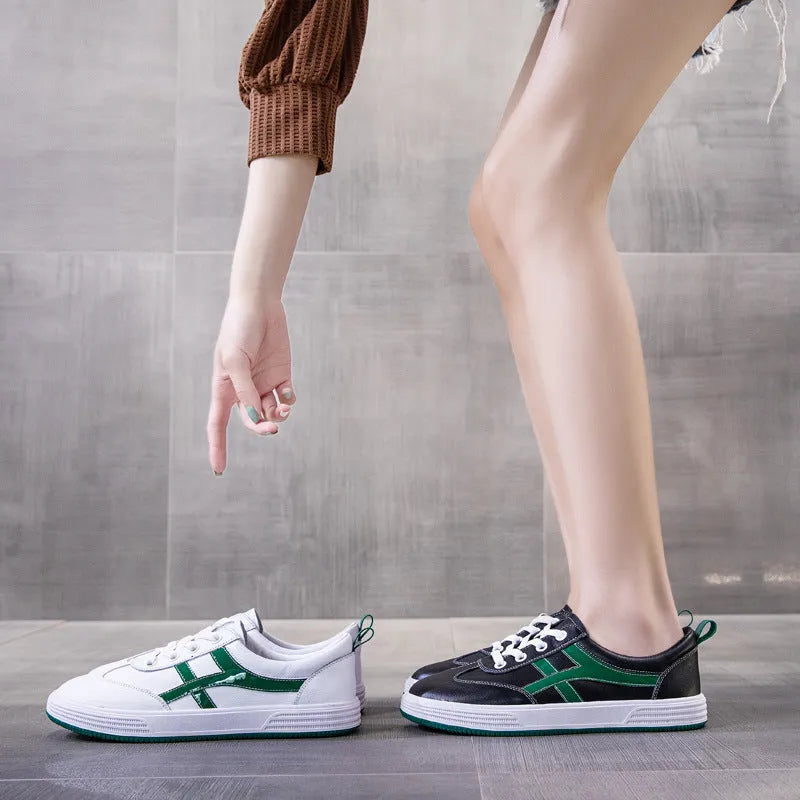 Women's leather Korean style sneakers with elastic band and round toe in black and white options