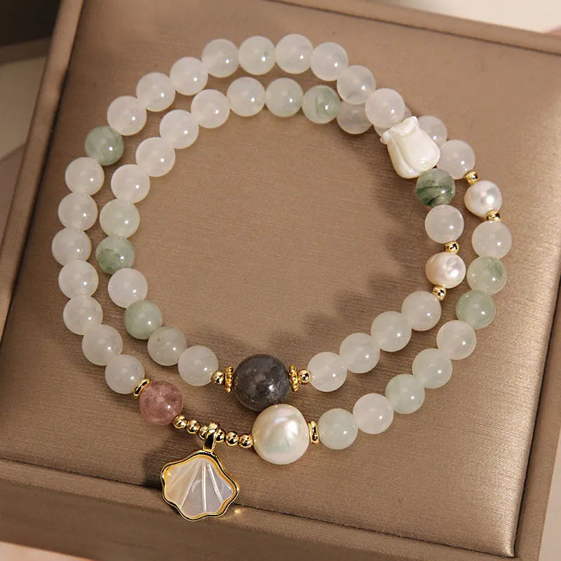 Crystal bracelet with gold-plated artificial gemstone inlay and Tianshan Jade shell ginkgo leaf pendant