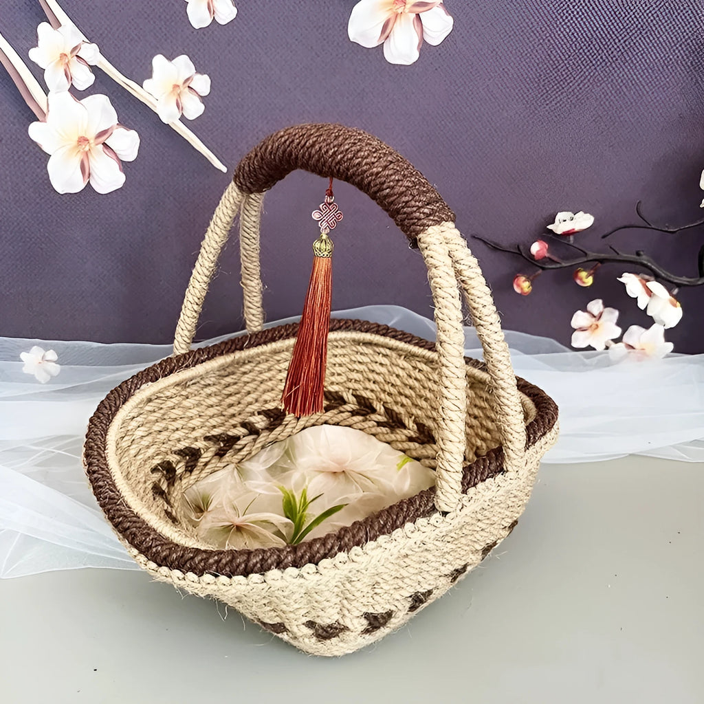 Hand-woven straw basket with hemp rope detailing in coffee brown colour