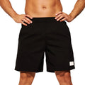 Men's solid colour quick-dry nylon sports shorts with straight leg opening.