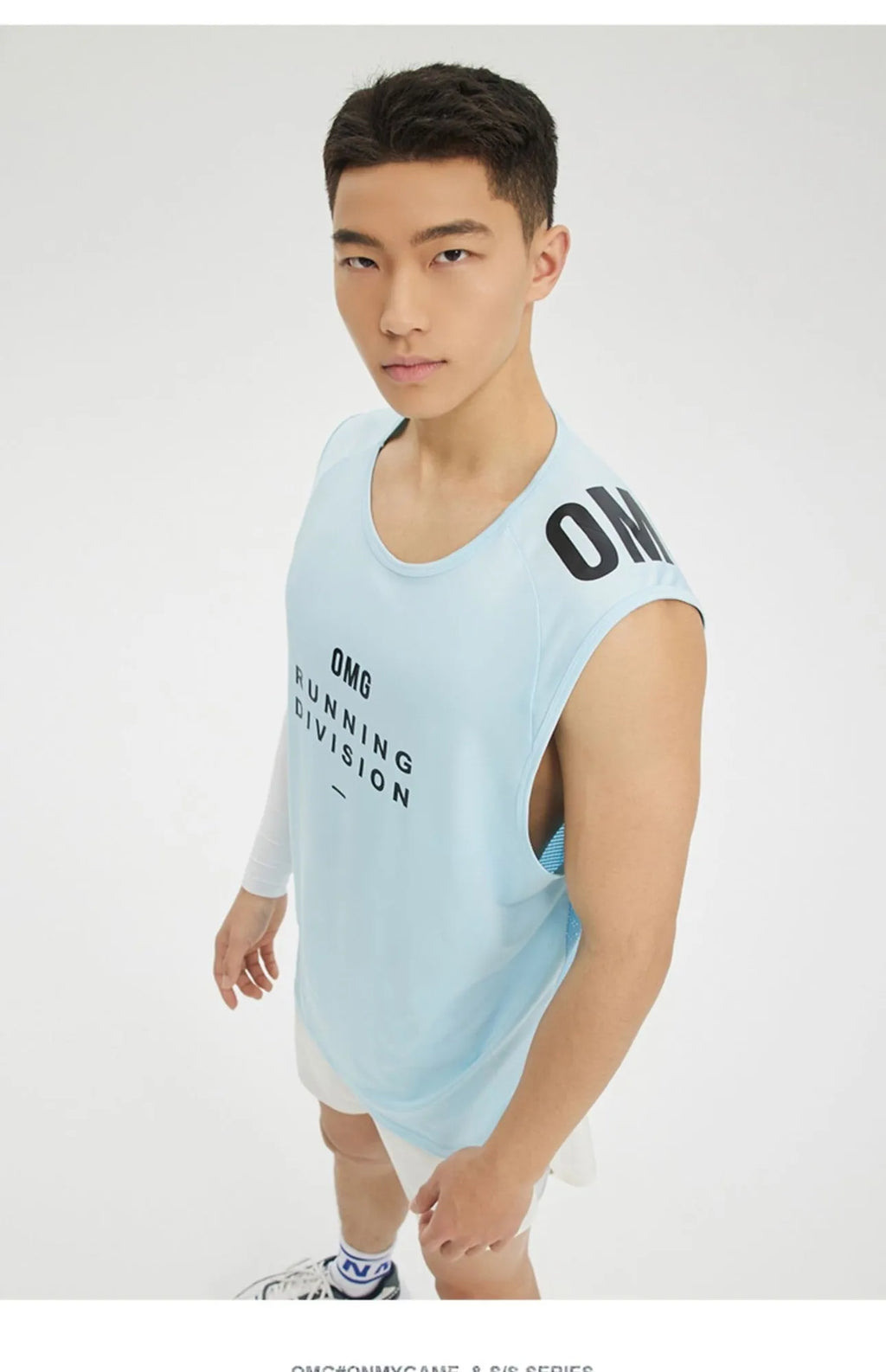 Man's lightweight loose fit mesh sports vest in solid colour for gym and fitness activities