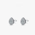Close-up of a pair of women's silver water drop shaped stud earrings on a plain background.