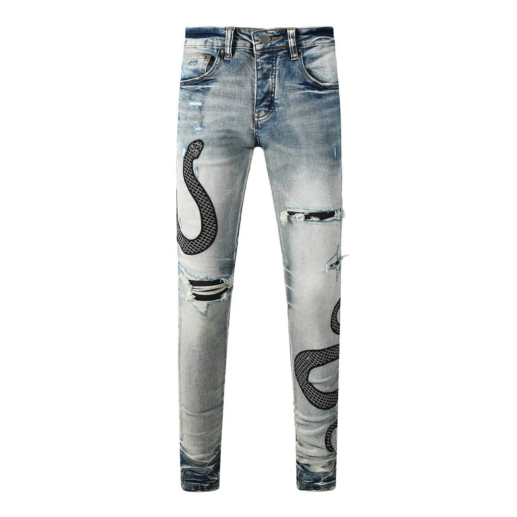 Distressed skinny jeans in mid-wash blue with street fashion styling and micro elasticity cotton fabric