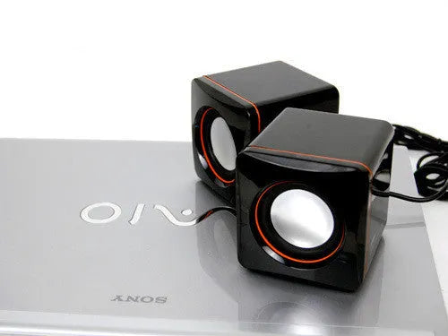 Black square USB-powered computer speaker for desktop PC audio enhancement