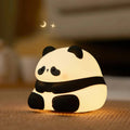 Panda-shaped silicone night light for children with warm white glow