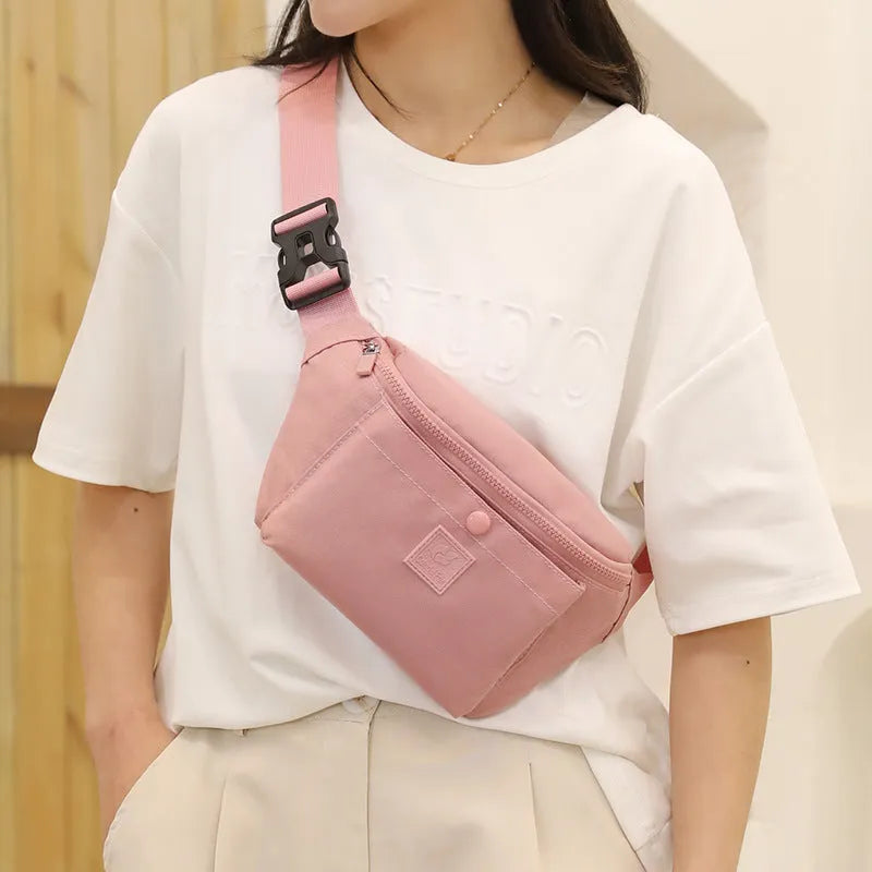 Large capacity crossbody nylon fanny pack for women in eight colours with zipper closure and internal pockets for running and travel