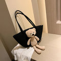 Cotton linen woven bag in dumpling shape with double shoulder straps and woven detailing