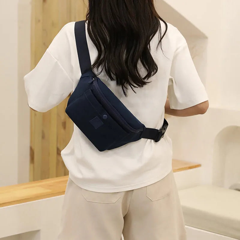Large capacity crossbody nylon fanny pack for women in eight colours with zipper closure and internal pockets for running and travel