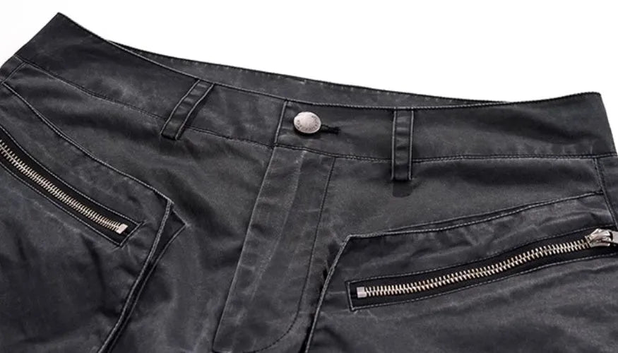 Men's slim-fit grey trousers with textured keel detailing on the legs.