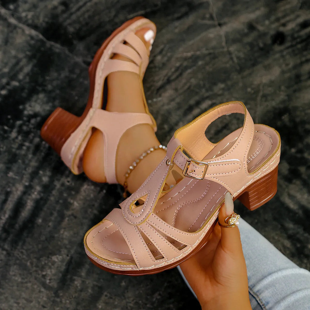 Women's black PU peep toe wedge sandals with an adjustable buckle strap.