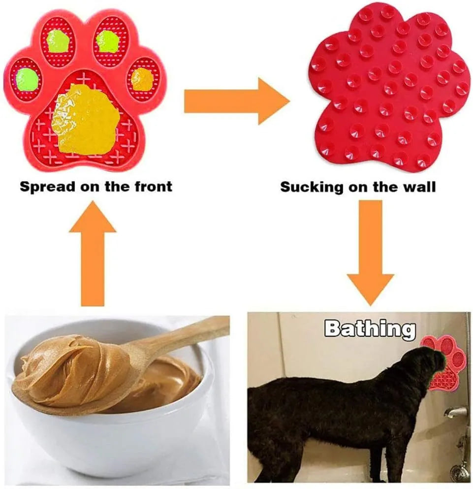 Blue bone-shaped silicone dog licking mat with suction cups on back, held against a tile wall.
