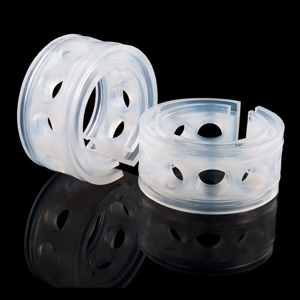 Two transparent rubber shock absorbers for car springs, shown with size measurement diagram.
