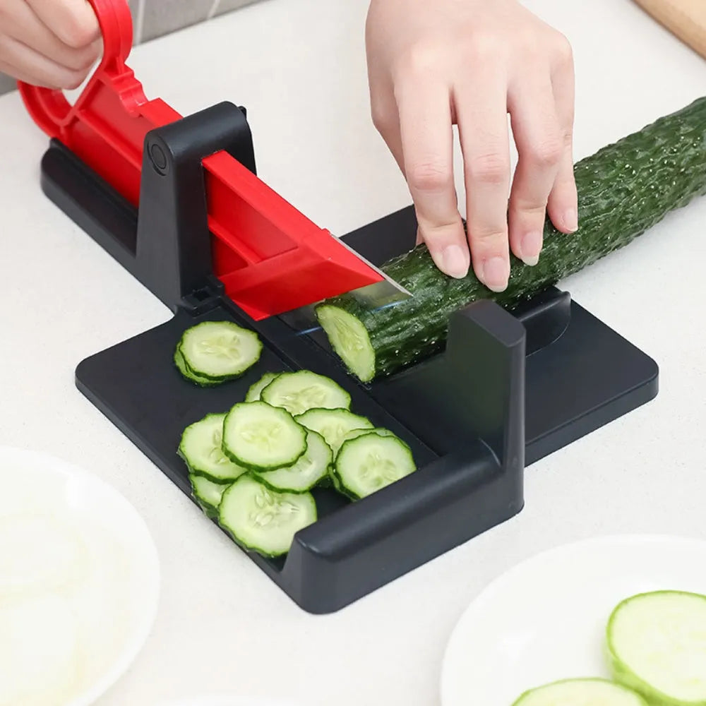 Green and red vegetable cutter with stainless steel blades for slicing carrots and potatoes