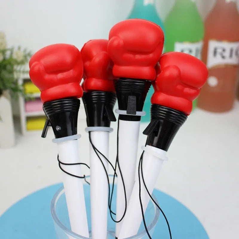 Set of four black pressure relief pens with boxing press mechanism and 0.7mm tips.