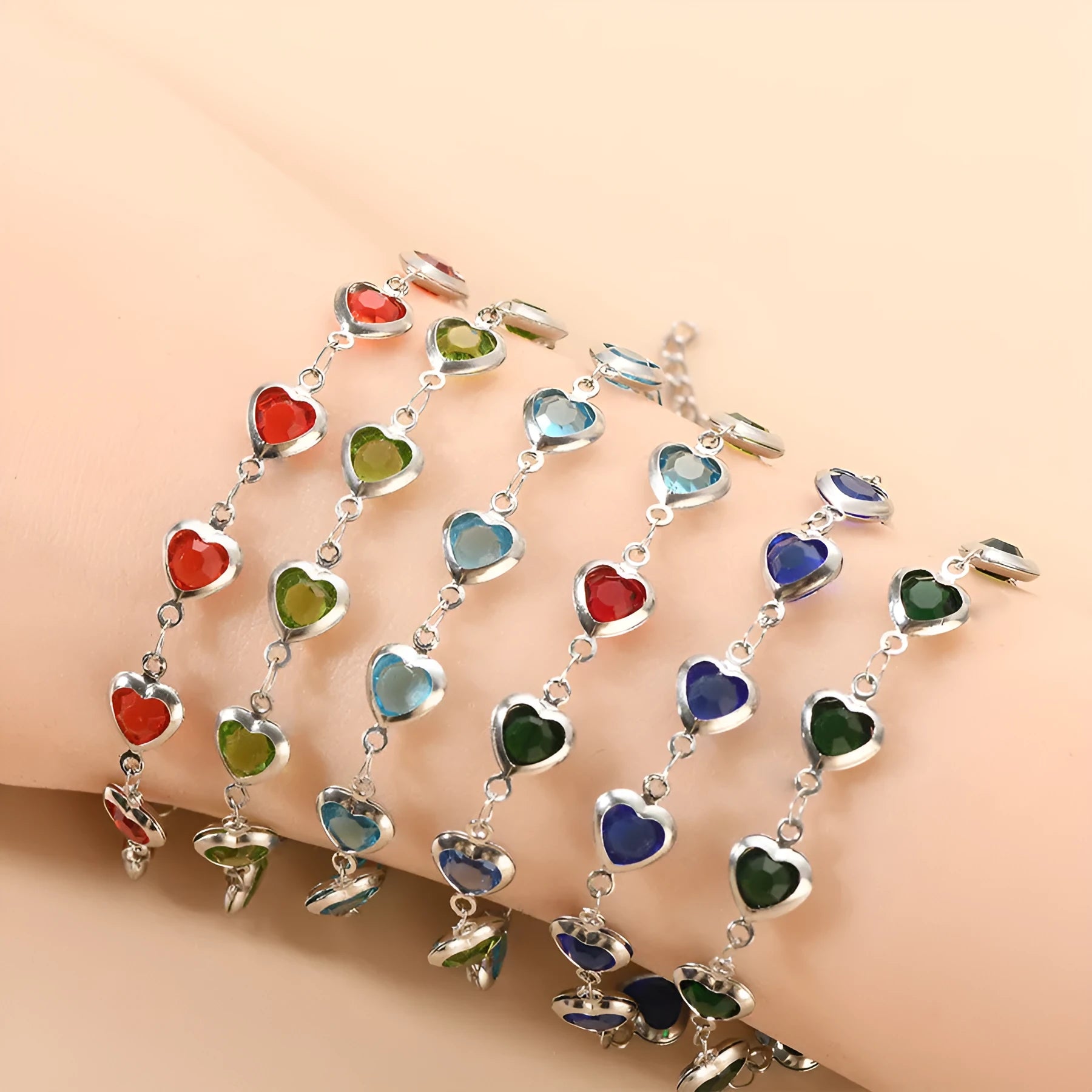 Devil's Eye Creative stainless steel geometric heart bracelet in an electroplated colour on a wrist.