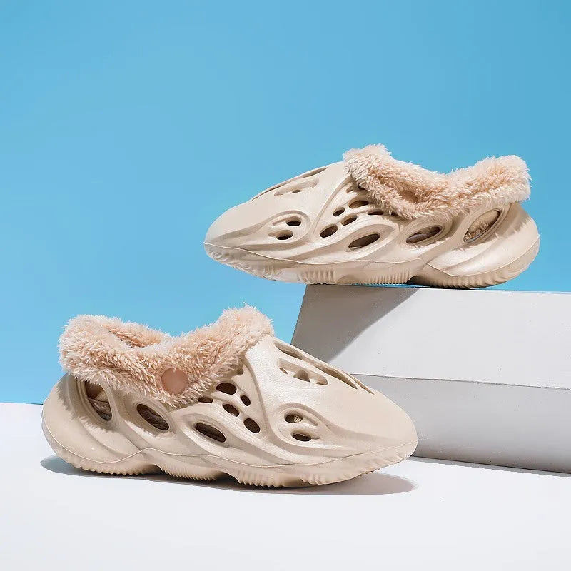 Unisex EVA hole slip slippers in apricot with removable warm plush cover on a light background