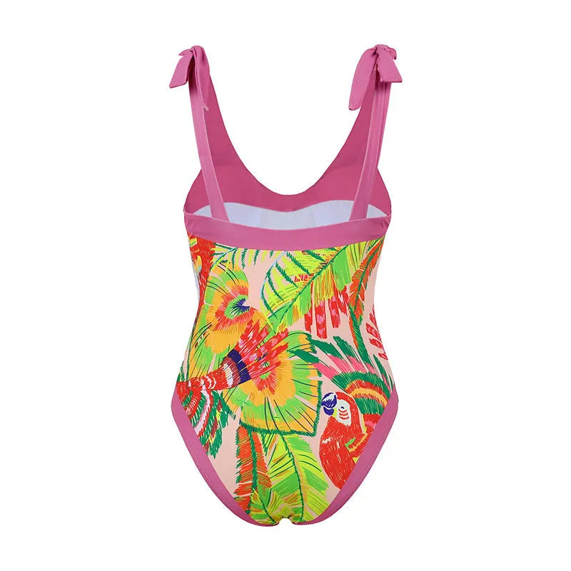 Pink floral print one-piece swimsuit with V-neck, covered belly design, and attached thin skirt