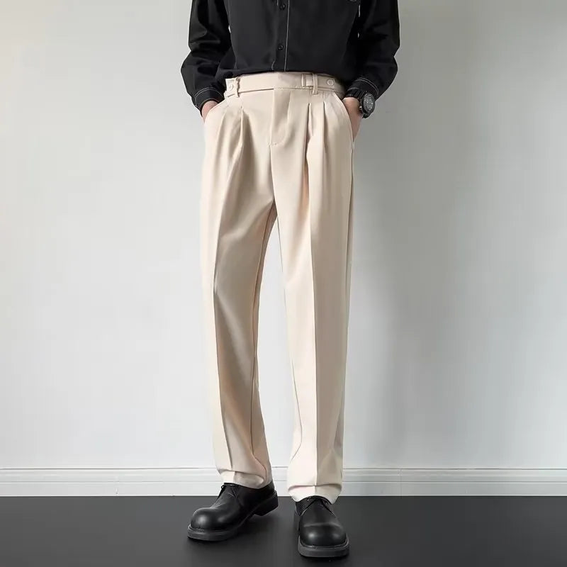 Man wearing straight loose fit suit trousers in apricot colour for formal or office setting