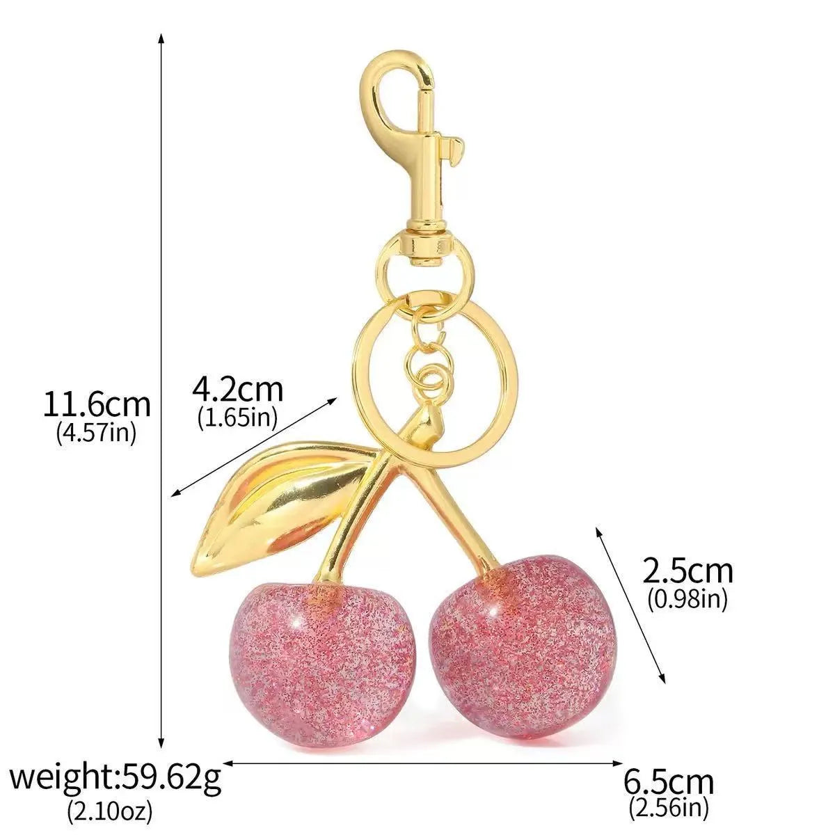 Close-up of a red zinc alloy keychain pendant shaped like a detailed three-dimensional cherry.