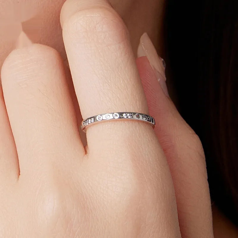 Silver Moss Password I Love You ring with oxidised black finish showing simple bracelet design