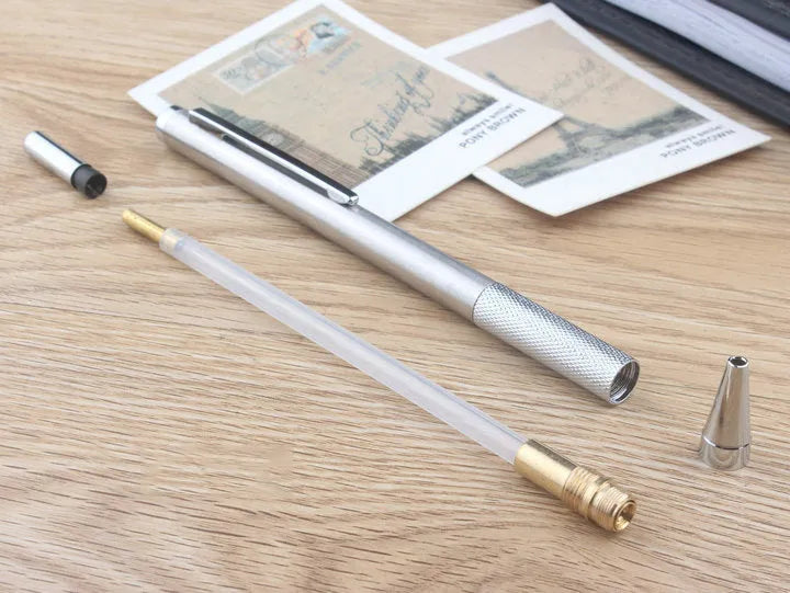 A metal automatic mechanical pencil with multiple lead size options including 0.5mm, 0.7mm, 0.9mm, 1.3mm, and 2.0mm.