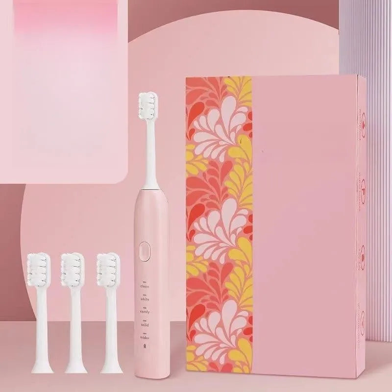 Rechargeable electric toothbrush with small yellow duck design, soft bristles, and USB charging cable