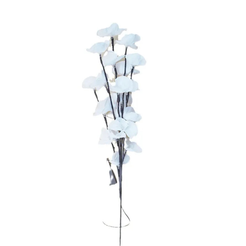 65cm tall pink LED phalaenopsis branch decorative light with fabric and plastic shell on bedside table