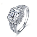 Geometric hollow design zircon ring in platinum-colour finish on copper, showing quadrilateral stone faceting