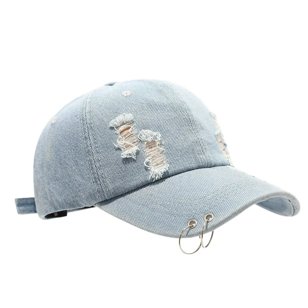 Men's adjustable cotton denim baseball cap in black on a plain background.