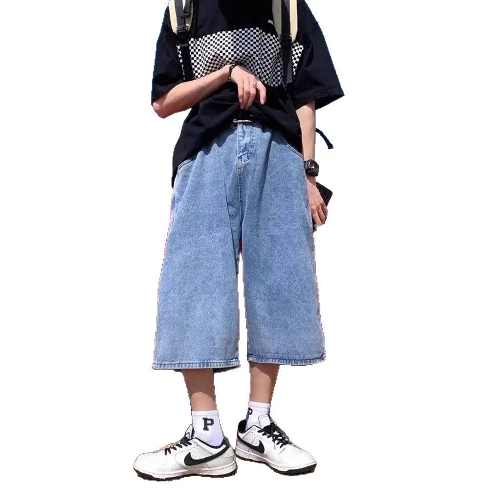 Men's blue washed denim pirate shorts with a cropped length, high waist, and straight leg cut.