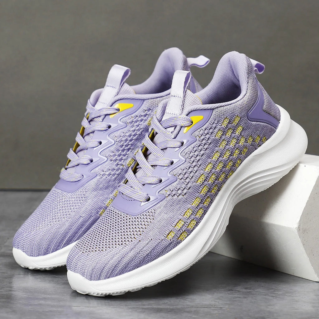 Women's Lavender Purple Flyknit running shoes with striped pattern, mesh upper, and flat EVA sole.