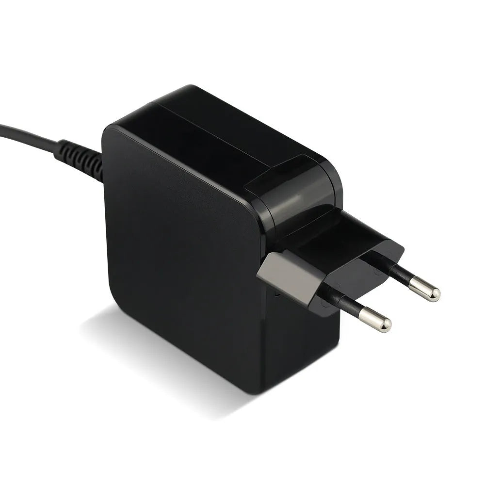 Black 45W laptop adapter with US and EU plugs showing 99.3mm length