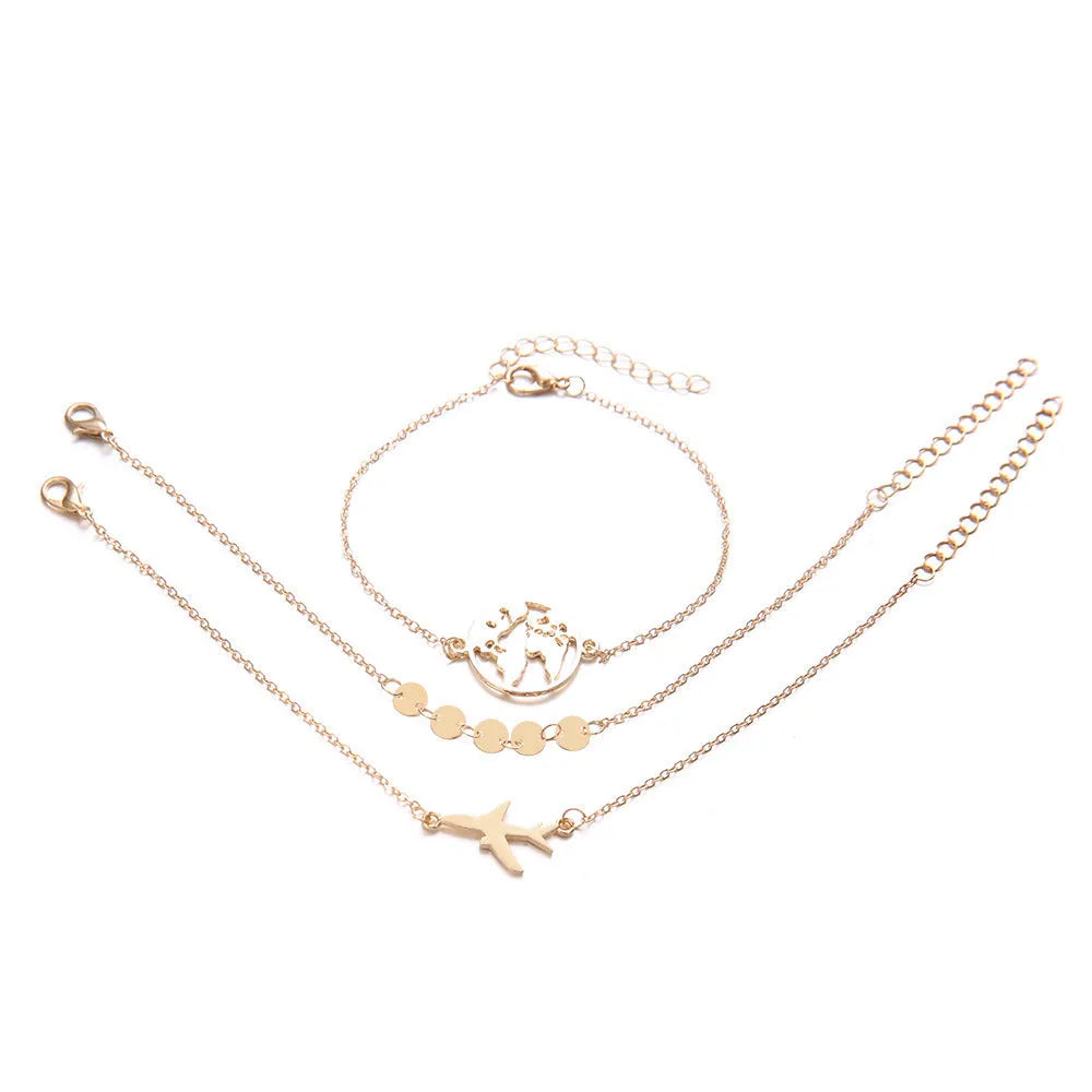 Three bohemian bracelets with aircraft map charm pendants in heart shape design