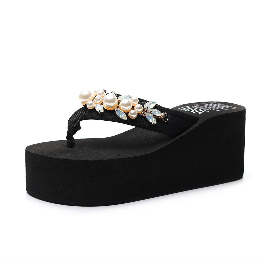 Women's black and beige high-heeled flip-flop slippers with cotton cloth uppers.