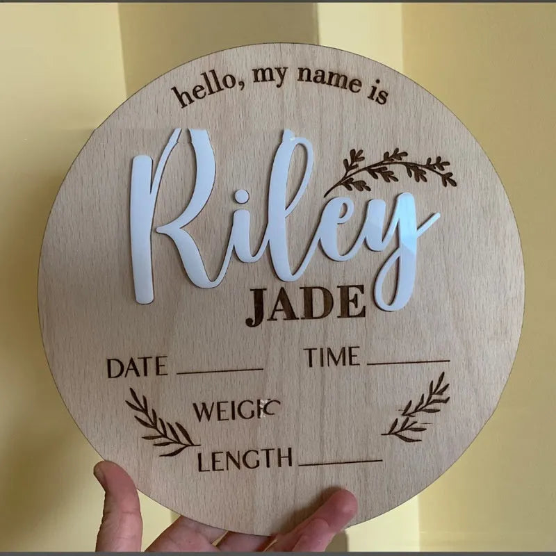 Personalised wooden square sign with baby's name, birth date, time, and weight engraved.