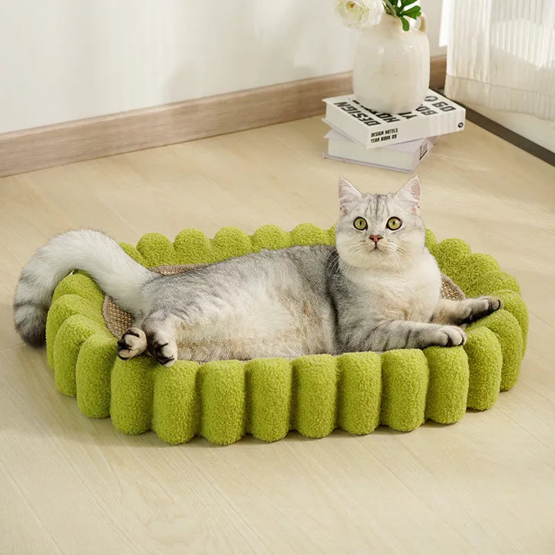 Green oval sisal cat scratch pad showing scratching surface and bowl-shaped lounging area