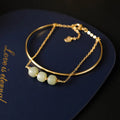 Women's Hetian jade lucky beads bracelet with gold inlay detailing in single, double and three bead versions