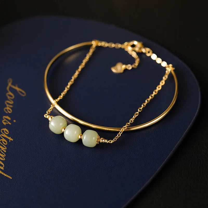 Women's Hetian jade lucky beads bracelet with gold inlay detailing in single, double and three bead versions