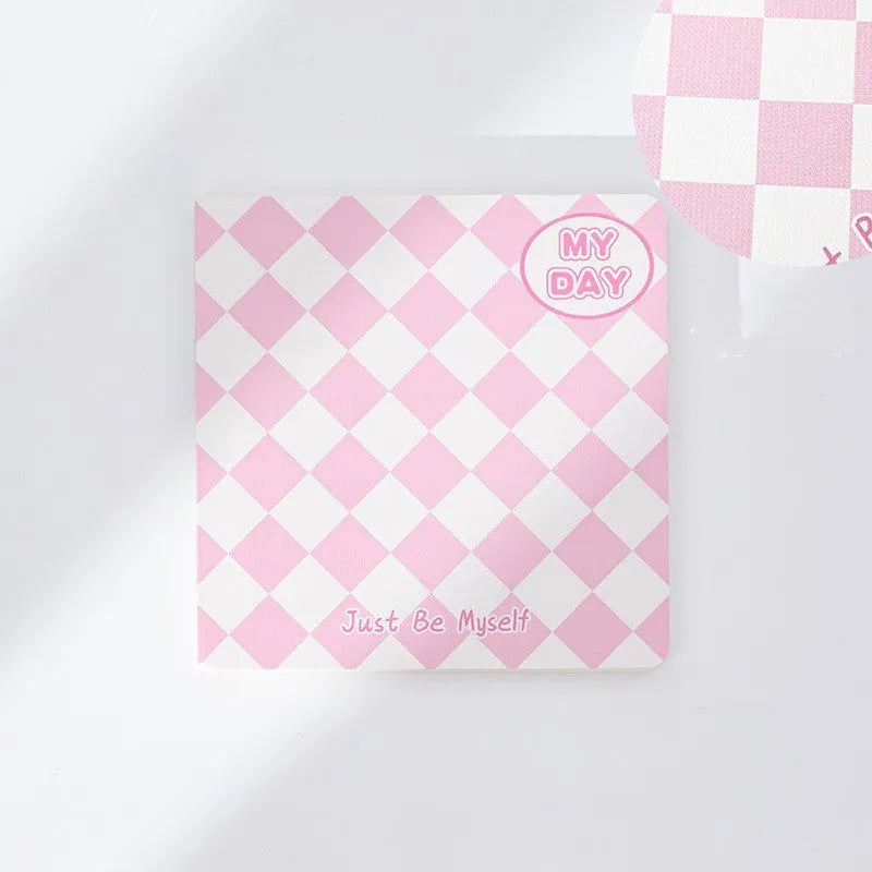Japanese Korean cute style grid notebook with a colourful embossed fruit design cover, showing 100 sheets inside.