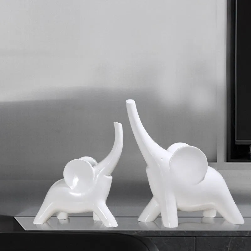 Large rose gold resin elephant ornament with modern simplicity style on a shelf