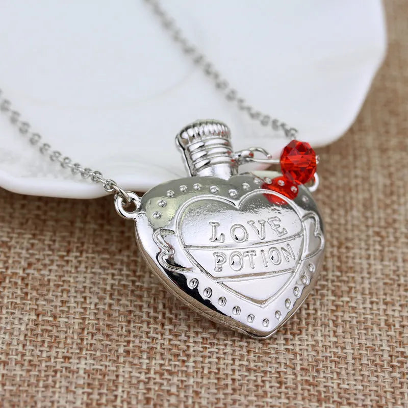 Love poison pill bottle pendant necklace in rose red on a box chain